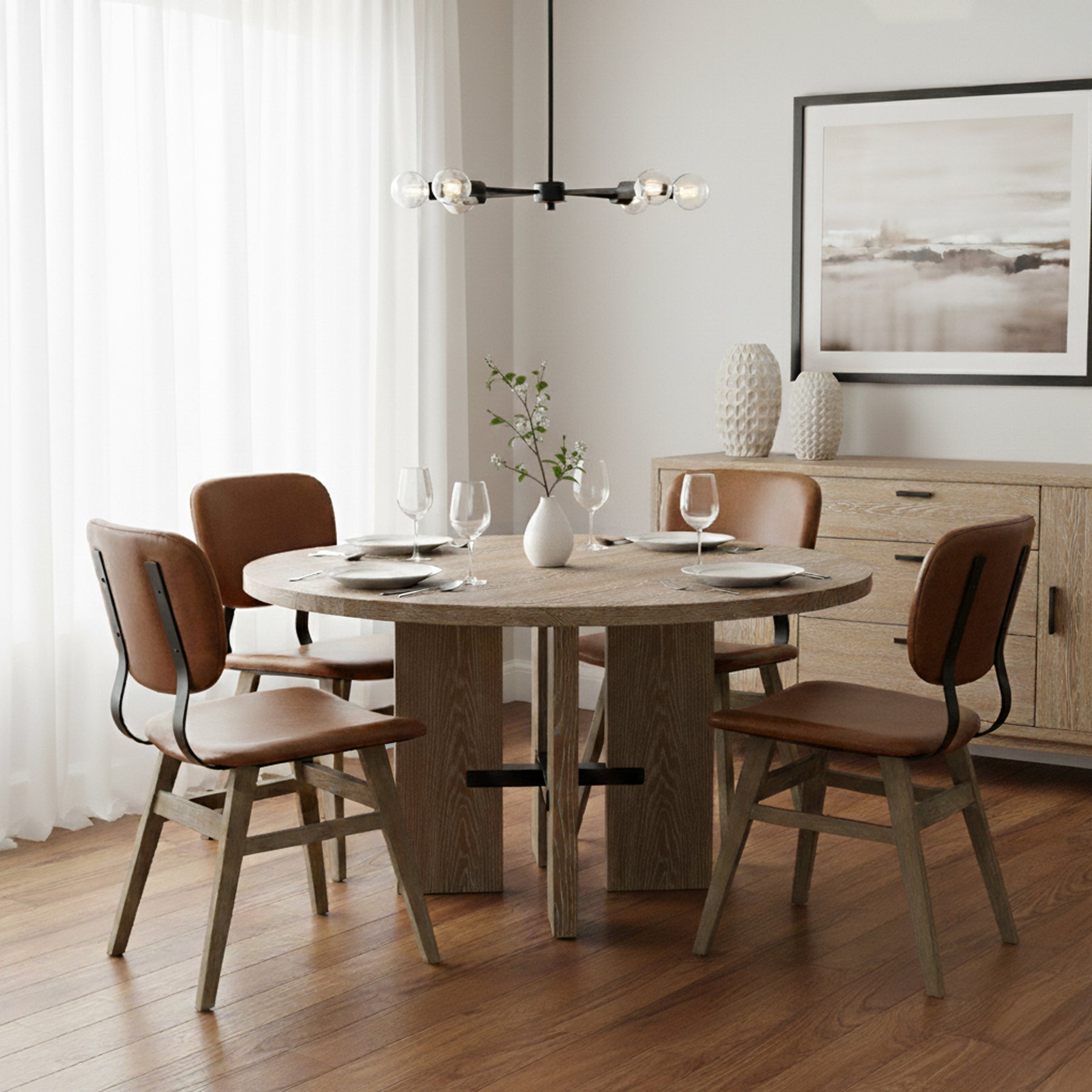 Fraser Round Dining Table - elegant seating for dining areas | Image 2 | InSTYLE Home & Rugs