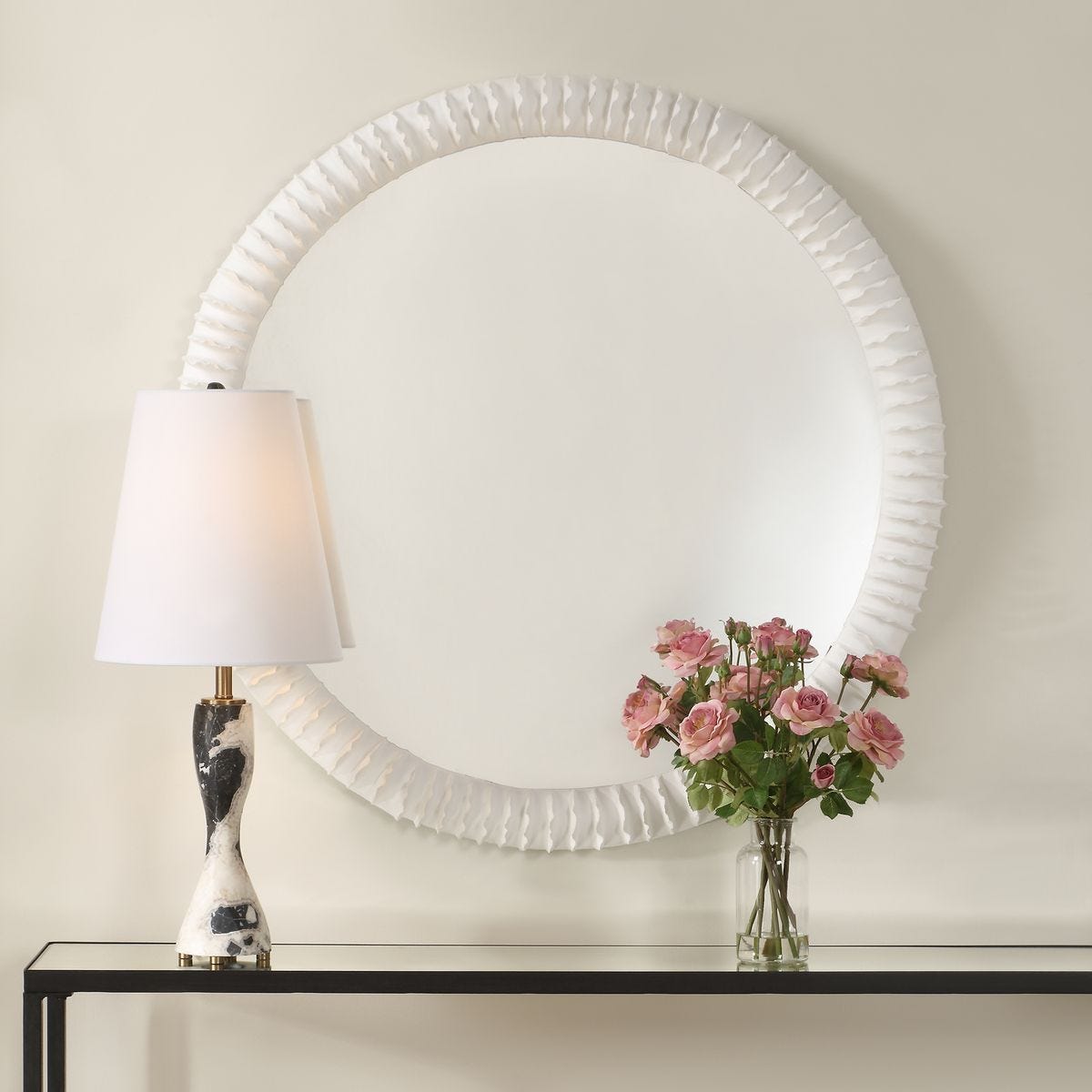 Akiko Round Mirror - perfect for enhancing light and creating a sense of space | Image 1 | InSTYLE Home & Rugs