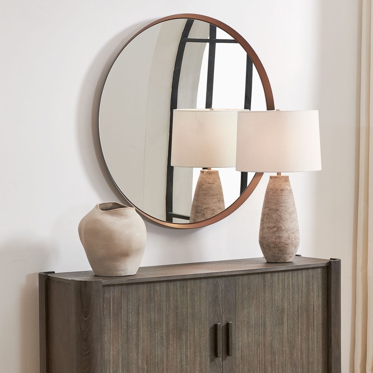 Torrado Round Mirror, Bronze - full-length mirror for creating the illusion of space and light | Image 3 | InSTYLE Home & Rugs
