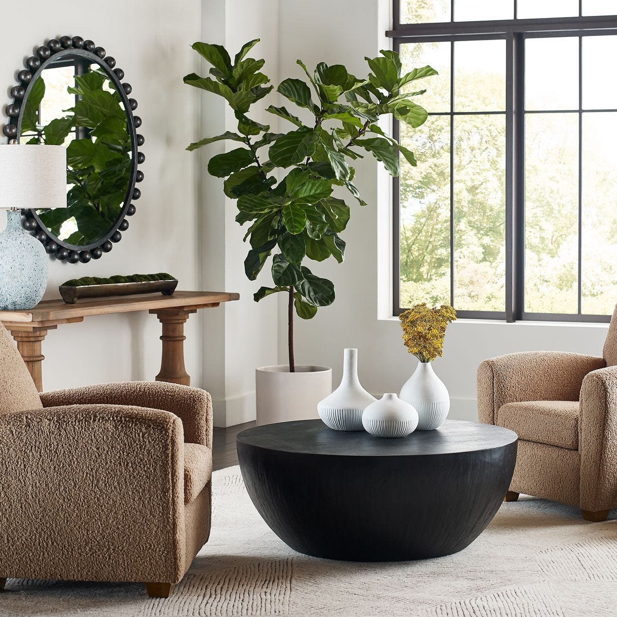 Cyra Round Mirror, Black - full-length mirror for creating the illusion of space and light | Image 7 | InSTYLE Home & Rugs