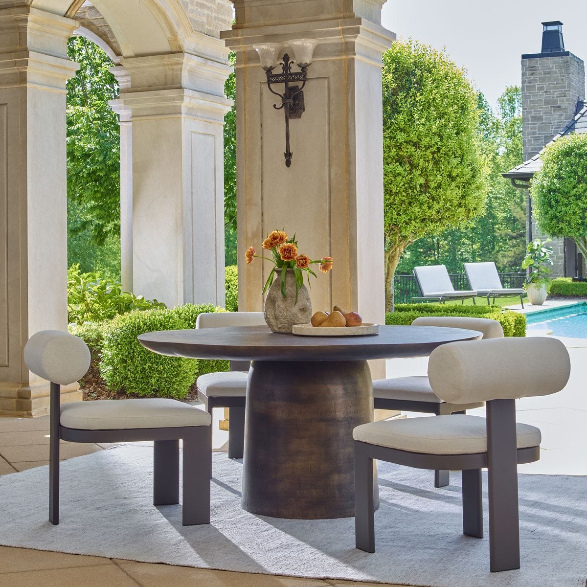 Madrone Indoor-Outdoor Dining Table, Golden Dark Bronze - perfect for family meals | Image 1 | InSTYLE Home & Rugs