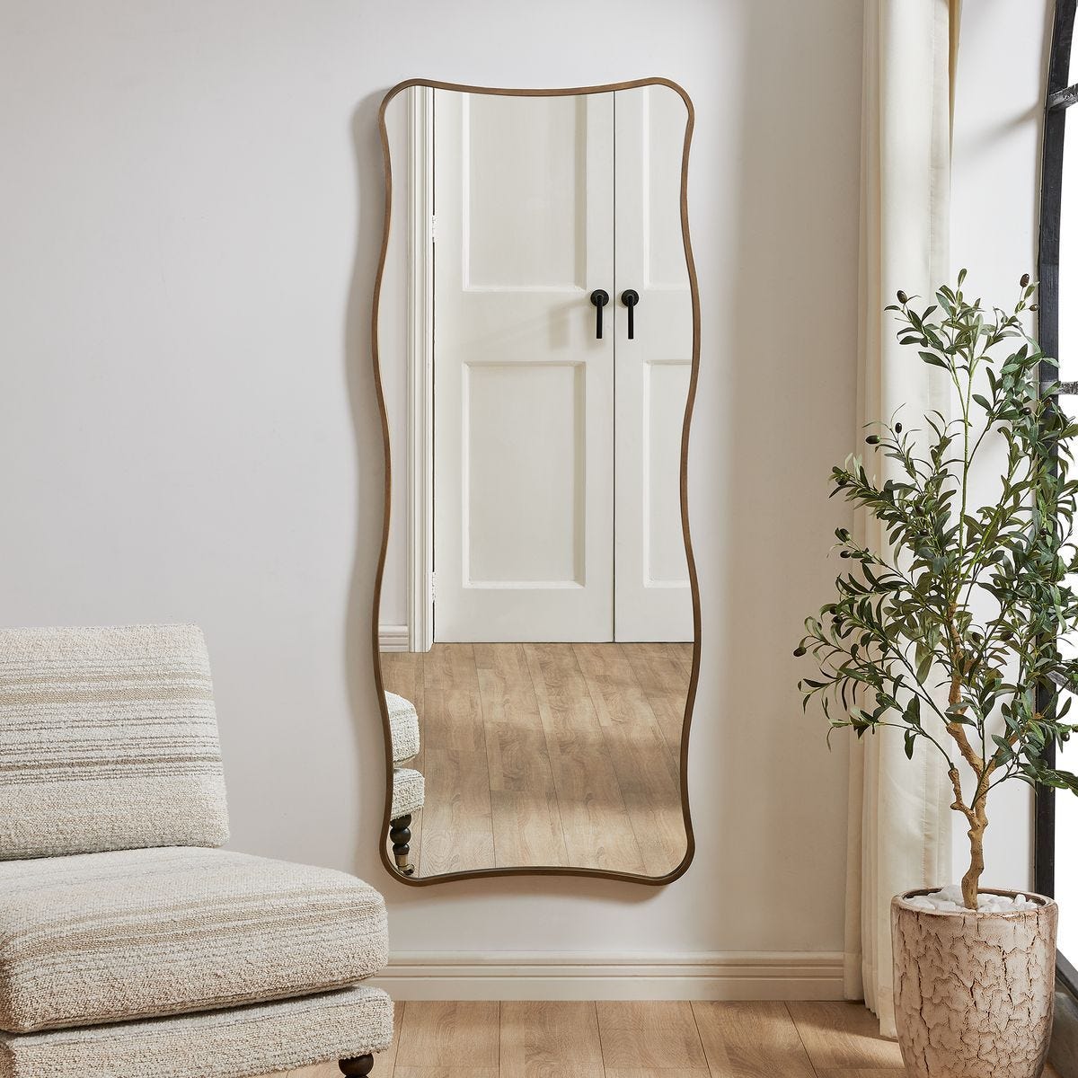 Pavia Tall Mirror, Gold - perfect for enhancing light and creating a sense of space | Image 2 | InSTYLE Home & Rugs